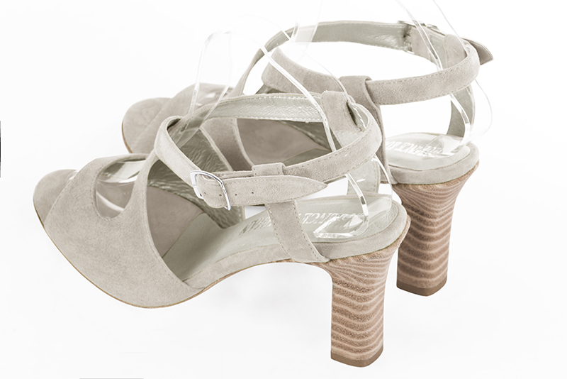 Off white women's open back sandals, with crossed straps. Round toe. High kitten heels. Rear view - Florence KOOIJMAN